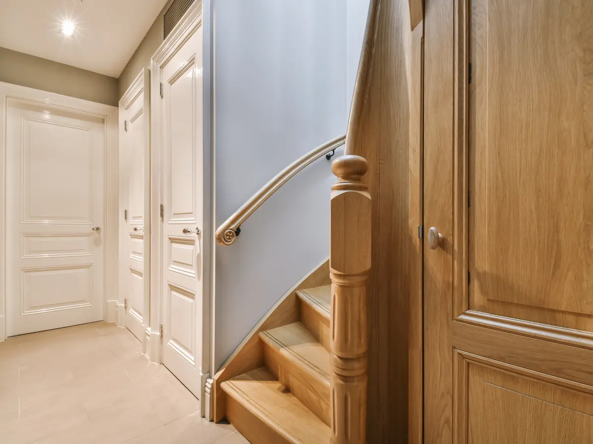 White painted interior doors and door frames in a corridor